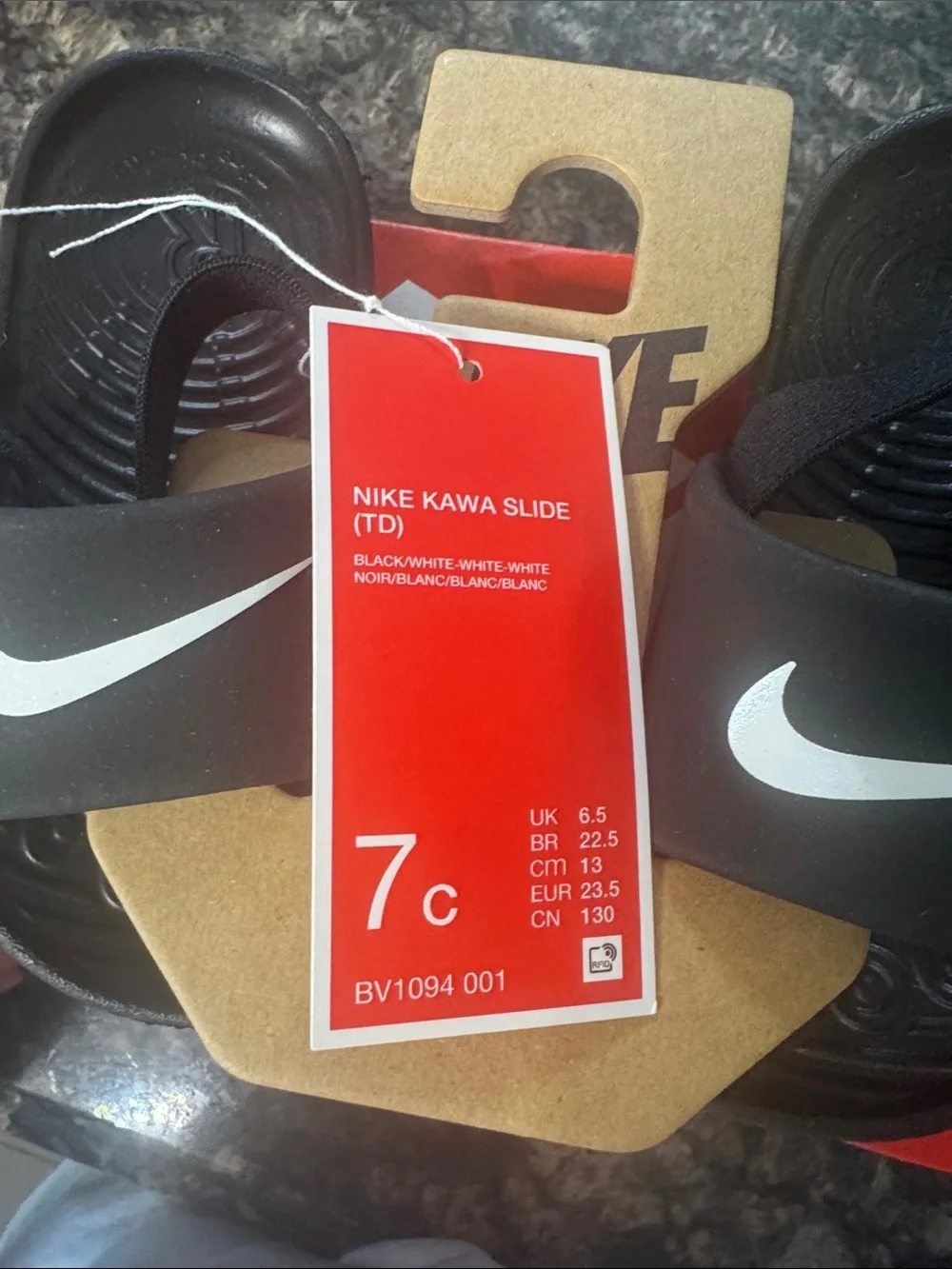 Nike Black Slide Sandals with White Swoosh Accent